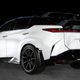 A photo of the rear quarter of the black and white Lexus RZ SUV concept car.